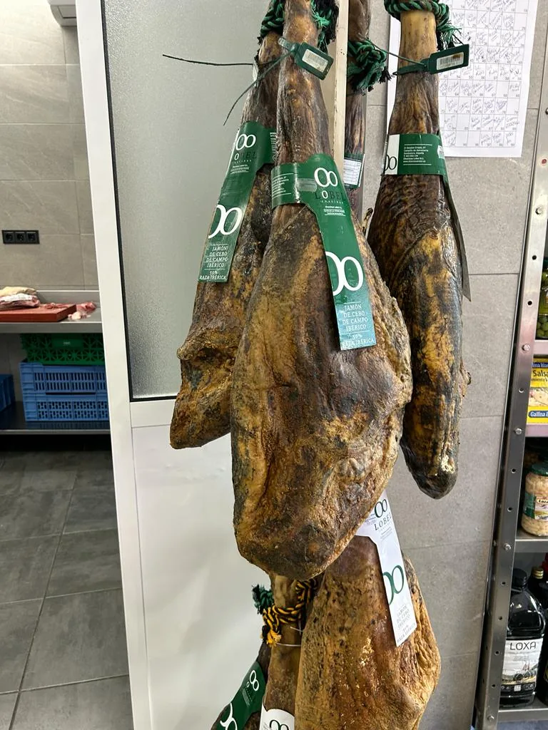Hams hanging in the shop
