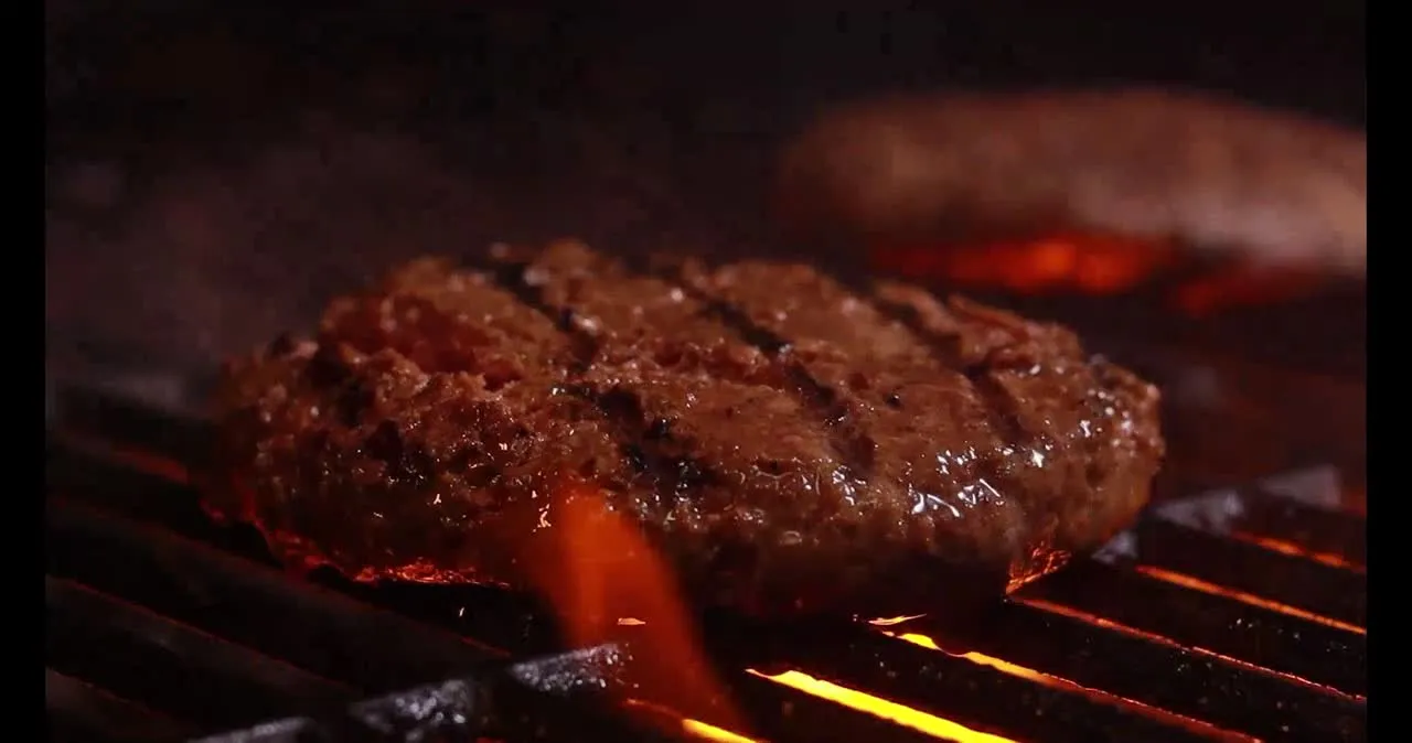 Meat cooking on the grill
